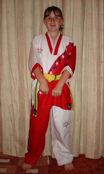 Charlotte Clarke posing in her England suit.