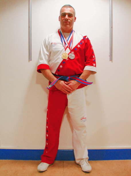 Simon Carroll with medals from North Mids and Hemel Comps.
