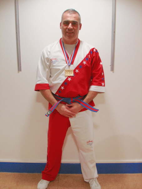 Simon Carroll with his medal from the British 08